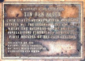 https://s37325.pcdn.co/wp-content/uploads/2018/03/1024px-Tin_Pan_Alley_plaque_crop-300x214.jpg